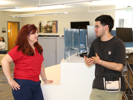A student ambassador speaking with a student